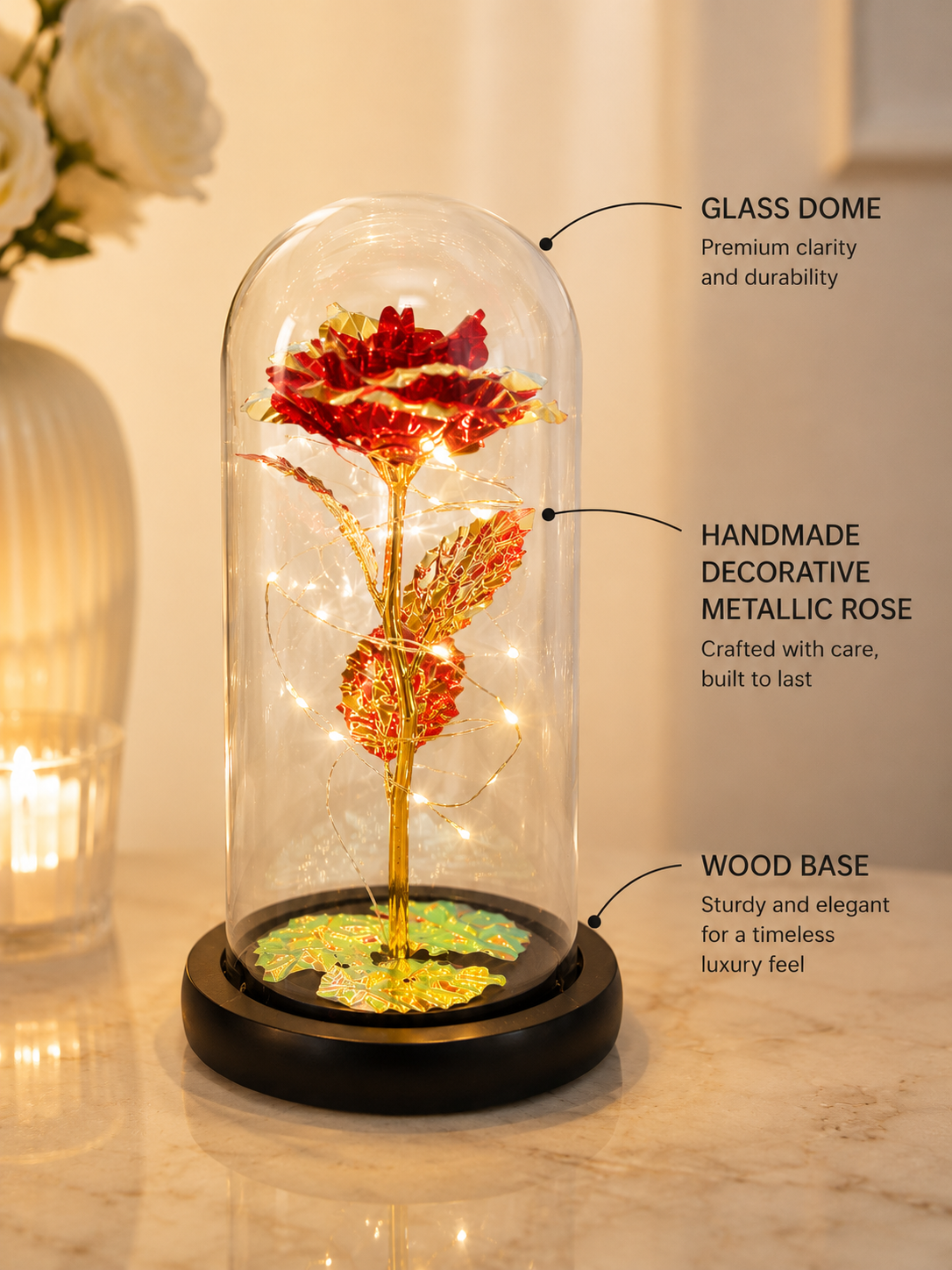 A decorative preserved rose under a clear glass dome on a black wooden base, lit with warm fairy lights, shown on a marble surface with feature callout text overlays.