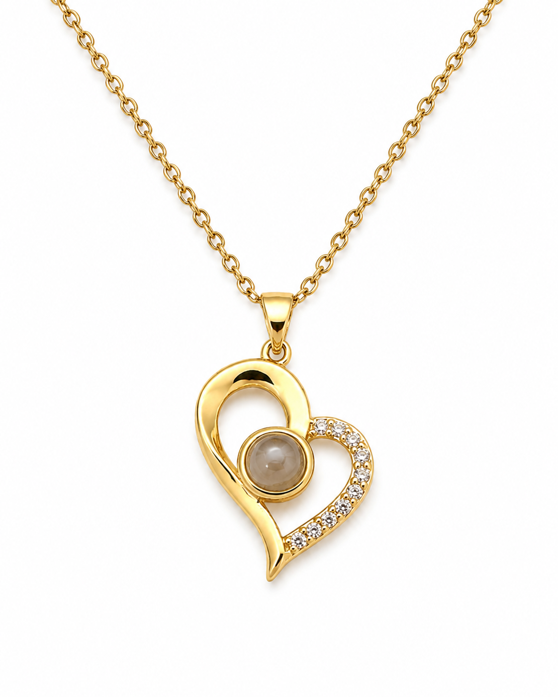 A gold heart pendant necklace featuring a polished gold heart design with a central round pearl and a curved crystal-accented section, shown on a white background.